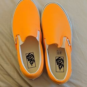 Neon orange slip-on Vans